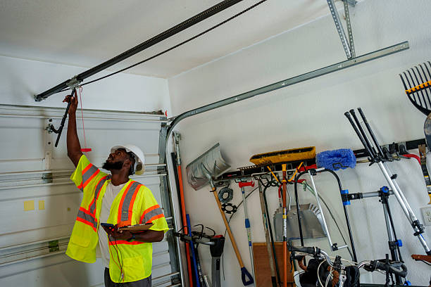 Professional Garage Door Panel Replacement technician working in Cayuga Heights, NY